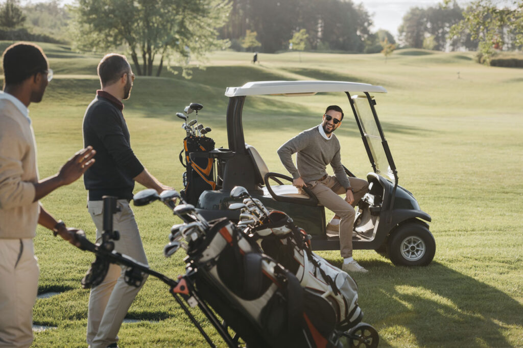friends-guys-near-golf-carts